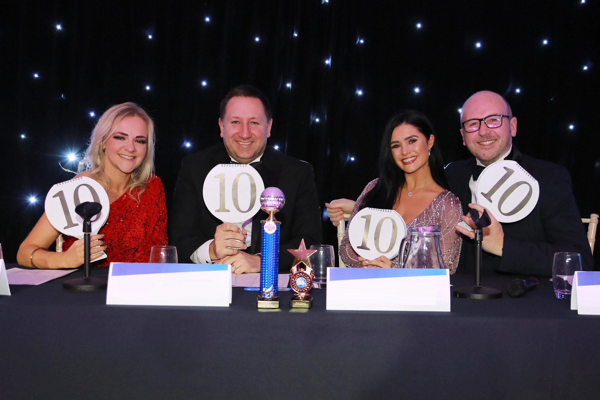 strictly judges holding up 10 out of 10 paddles