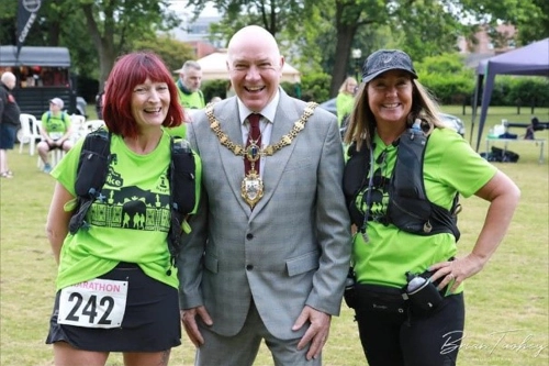 Photograph of two Marathon walkers and Warrington Mayor