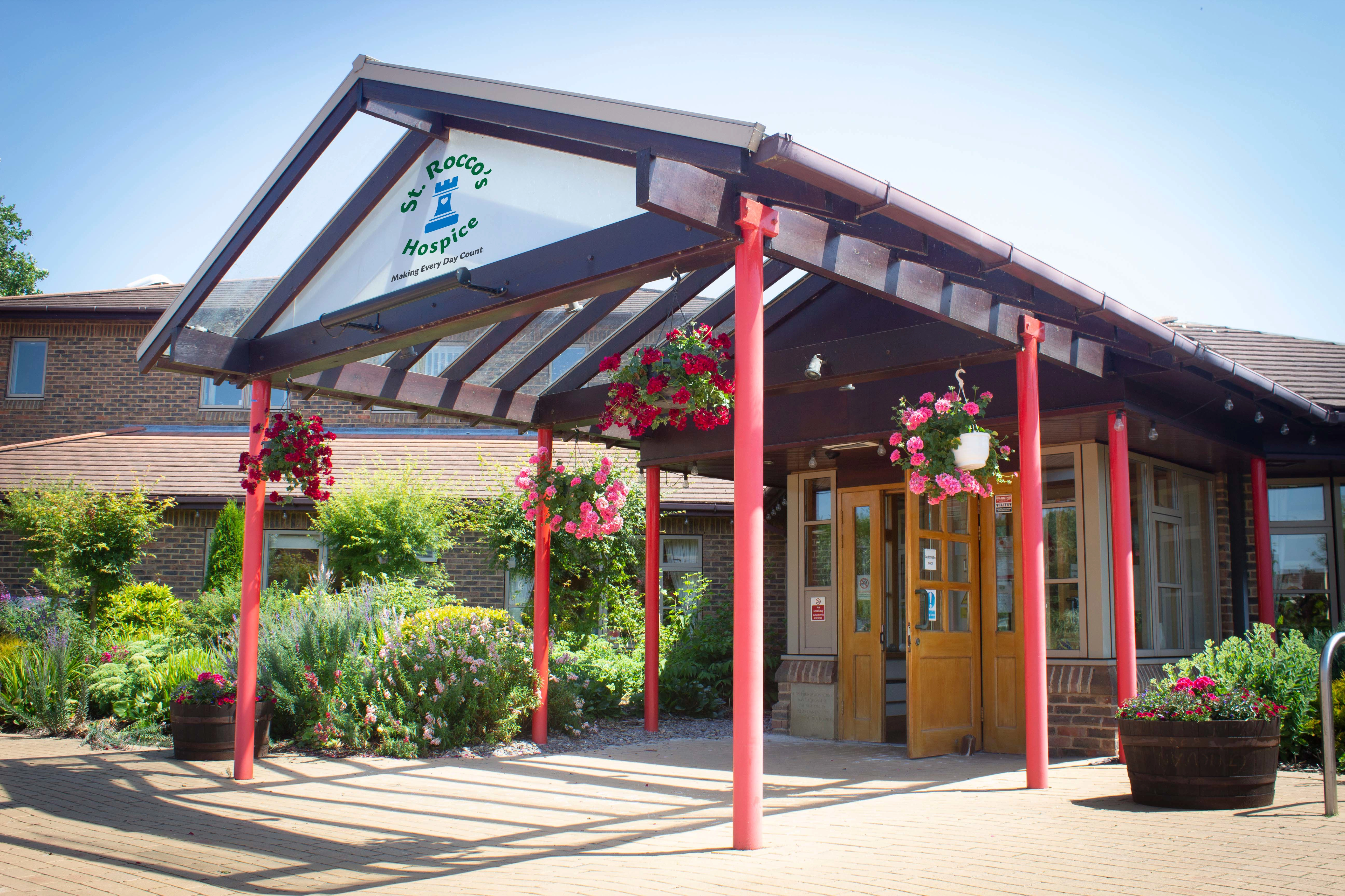 The Brick Bank Park Pavilion with a St. Rocco's Bereavement Cafe sign outside